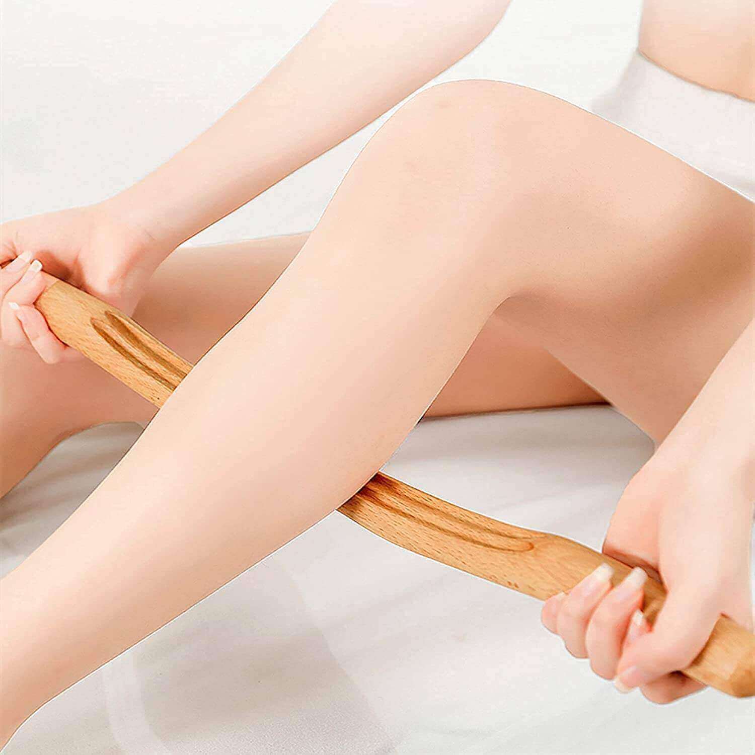 Wooden Gua Sha Massager for Therapy, item on the calf