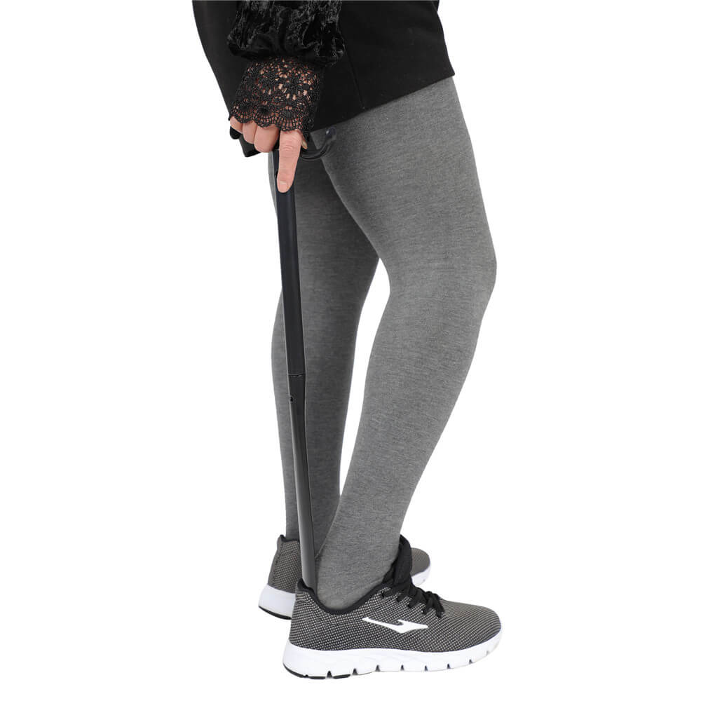 long dressing stick, as a shoe horn