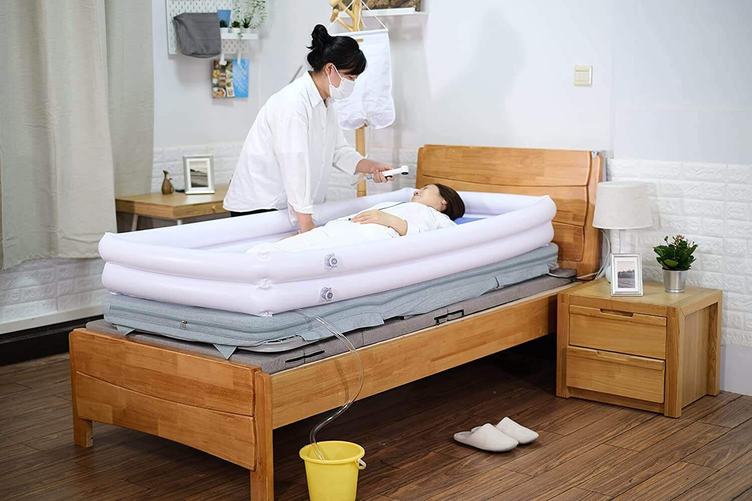 Manual Inflatable Bathtub for Bath Aids, one is taking care of the other use the bathtub