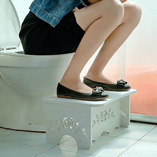 fanwer potty stool for pooping made of wood-plastic board, women on the toilet
